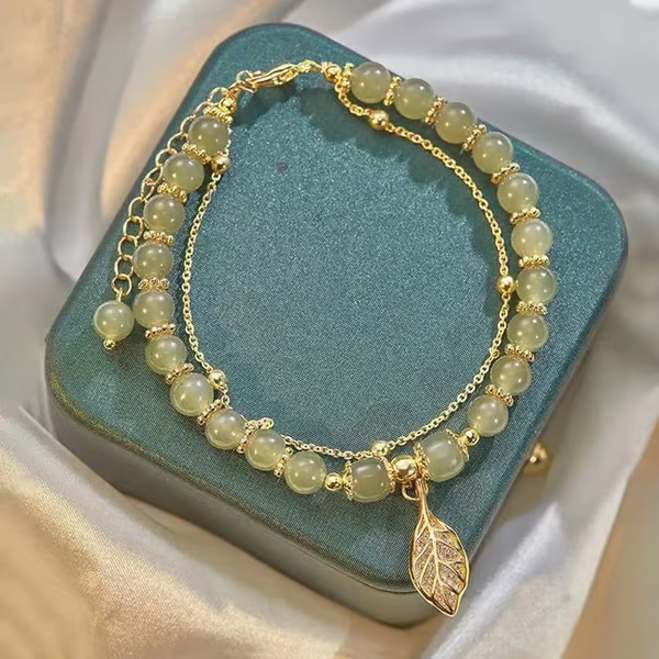 Exquisite Hetian Jade Bracelet with Gold Leaf – the Perfect Gift for Your Loved One.