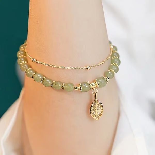 Exquisite Hetian Jade Bracelet with Gold Leaf – the Perfect Gift for Your Loved One.