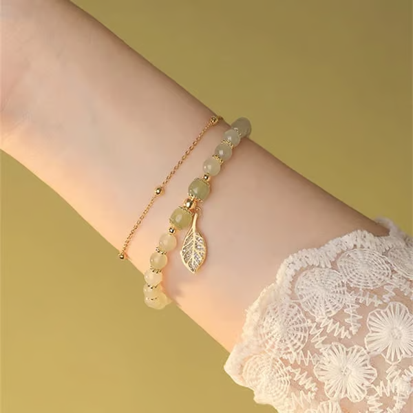 Exquisite Hetian Jade Bracelet with Gold Leaf – the Perfect Gift for Your Loved One.